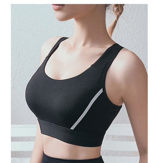 The New Beauty Back Mesh Breathable Quick-drying Shockproof black sports bra featuring full cup design and fixed double shoulder straps.