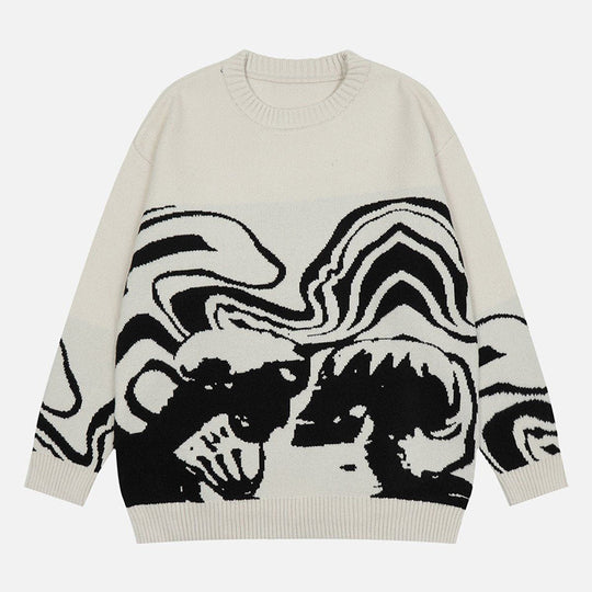 Men's and women's sweaters featuring a dark style knitwear design with abstract skull patterns in black and white.