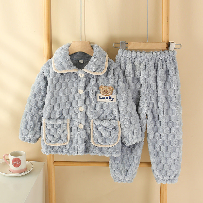 Children's Pajamas Autumn Flannel Home in light blue fluffy fabric, featuring a cozy jacket and matching pants.