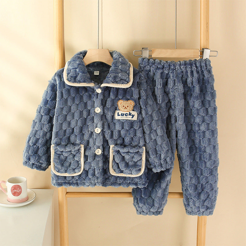Children's Pajamas Autumn Flannel Home in light blue with plush texture, suitable for chilly nights.